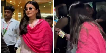 जूम करके देखा तो उड़ गए होश! अनुष्का शर्मा के मोबाइल स्क्रीन पर लगी है इस शख्स की फोटो, वीडियो वायरल!
